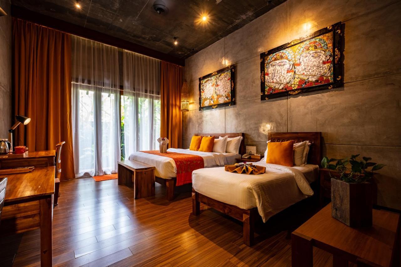 Bilik Deluxe Triple dengan Pemandangan Taman dan Tab Mandi
